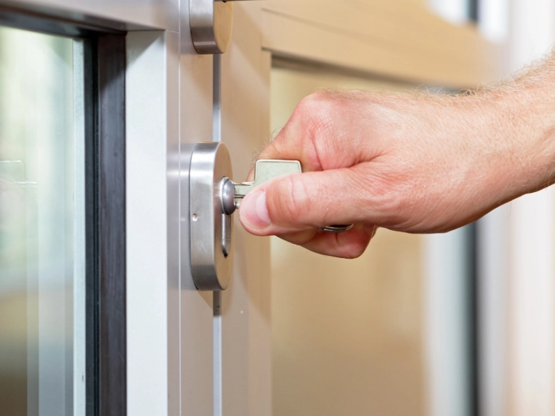 A commercial door being locked